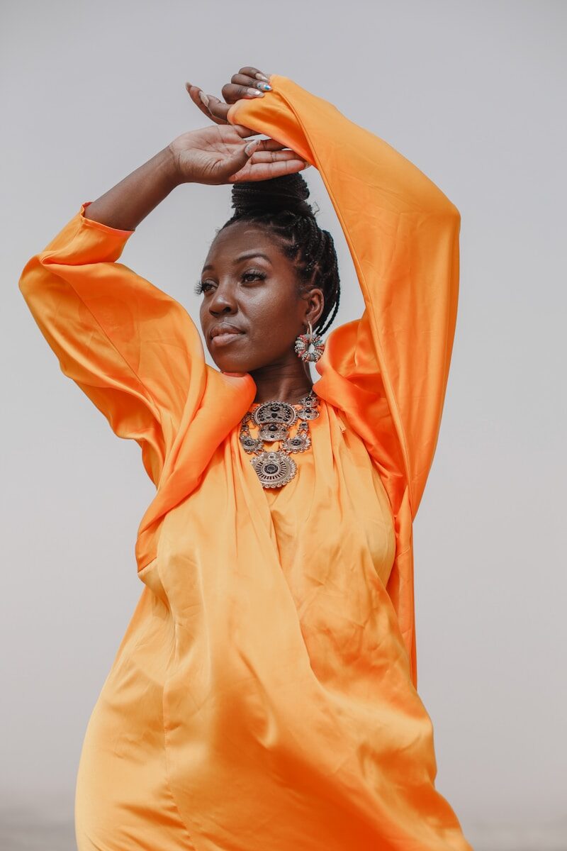 مجموعات a person in an orange robe