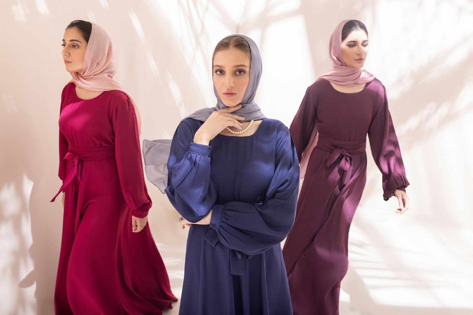 بيت A group of women standing next to each other